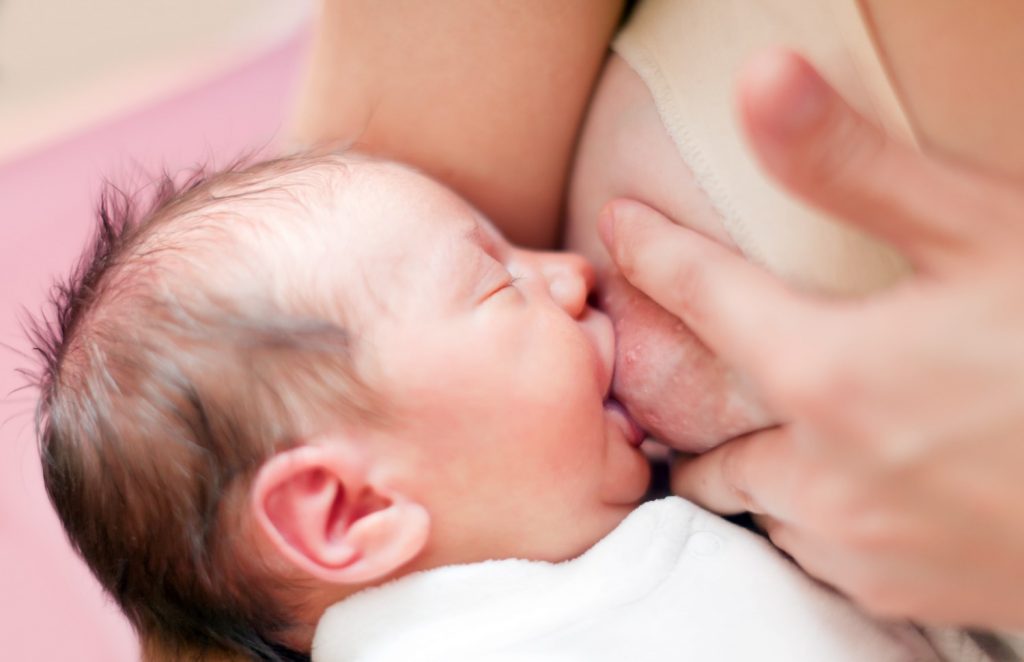 Holding Properly Breastfeeding